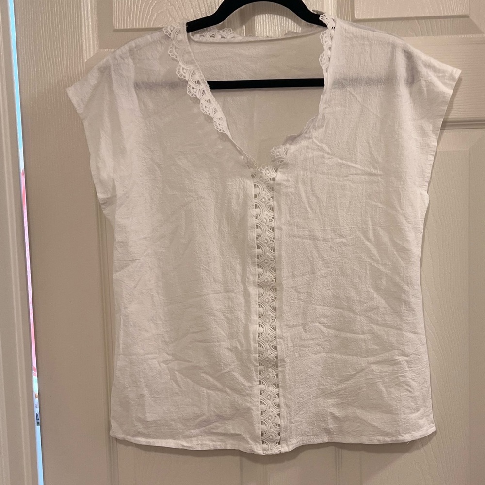 White blouse with crochet detail